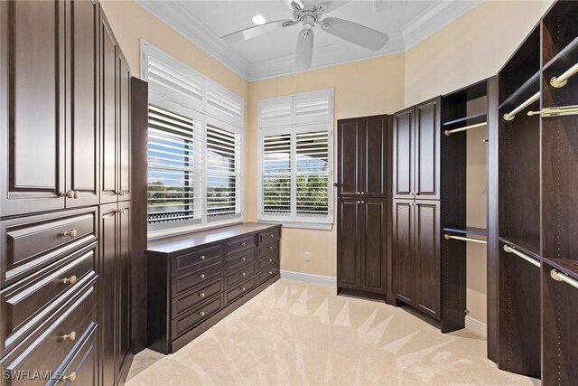 28551 Calabria Ct Unit 202, Naples, FL 34110 - walk in closet featuring ceiling fan and light colored carpet