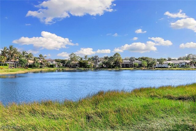 28551 Calabria Ct Unit 202, Naples, FL 34110 - view of water feature with a residential view