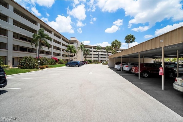 7430 Lake Breeze Dr Unit 402, Fort Myers, FL 33907 - view of covered parking lot