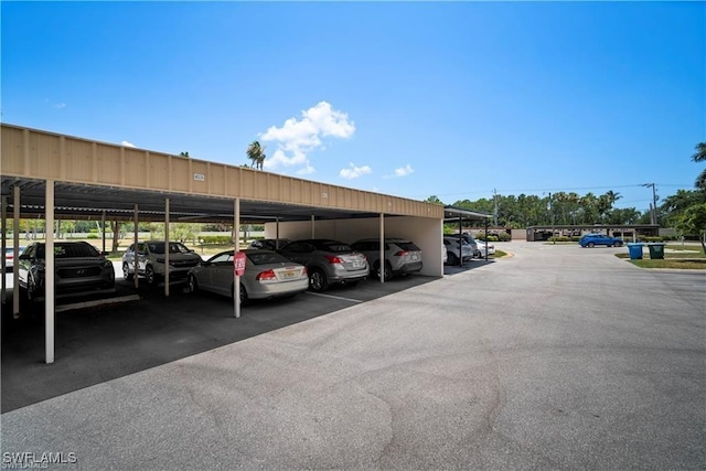 7430 Lake Breeze Dr Unit 402, Fort Myers, FL 33907 - view of covered parking lot