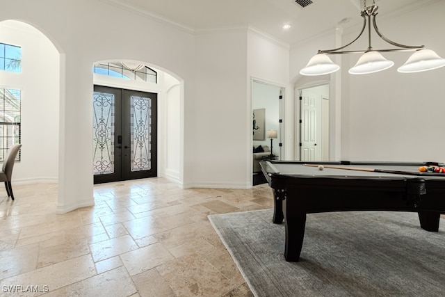 playroom featuring crown molding, french doors, a high ceiling, and pool table