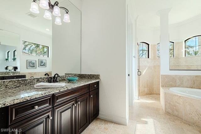 bathroom with vanity, separate shower and tub, and crown molding