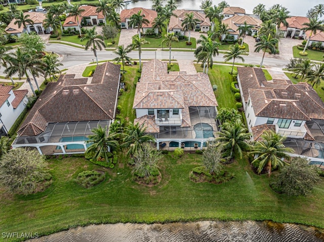 drone / aerial view with a water view