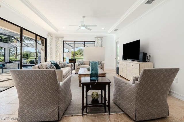 3273 Runaway Ln, Naples, FL 34114 - living area with a ceiling fan, ornamental molding, baseboards, a raised ceiling, and recessed lighting
