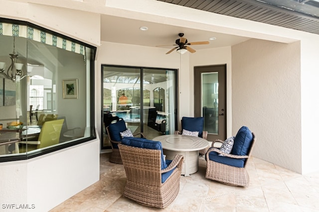 view of patio with ceiling fan