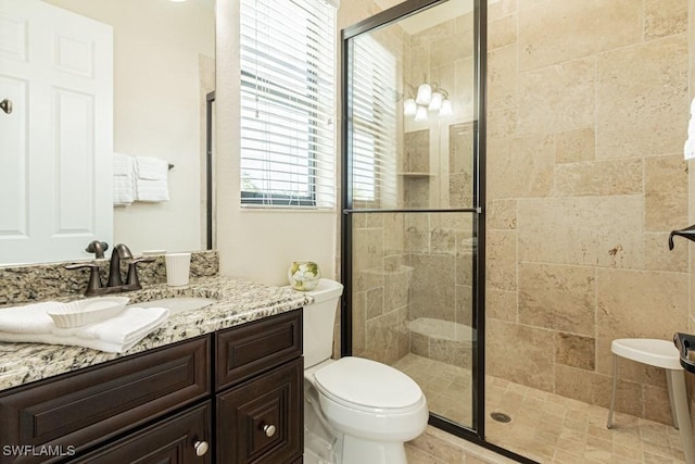 3273 Runaway Ln, Naples, FL 34114 - full bath with a shower stall, toilet, and vanity