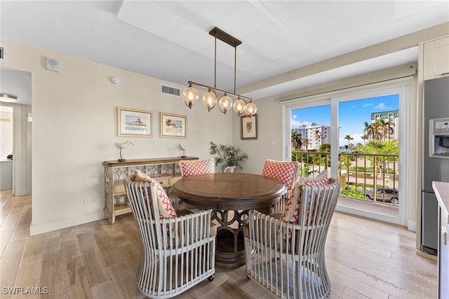 dining room featuring light hardwood / wood-style floors