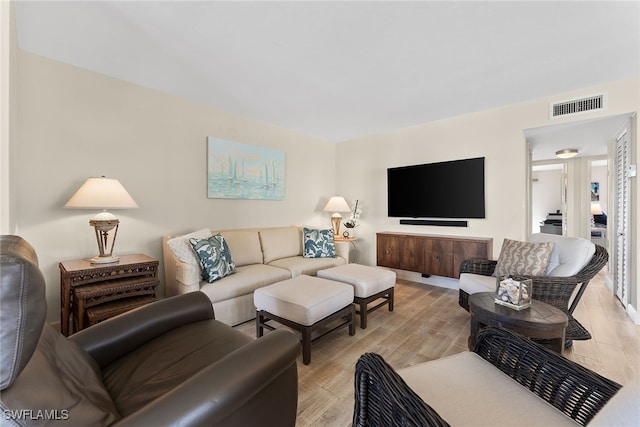 living room featuring light wood-type flooring