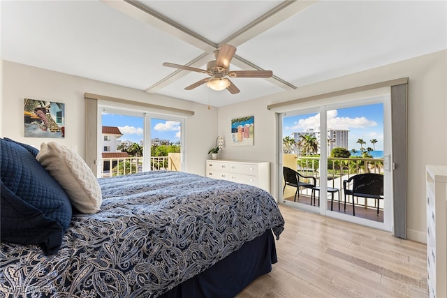 bedroom with access to outside, multiple windows, light hardwood / wood-style floors, and ceiling fan