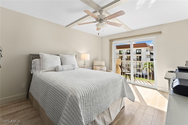 bedroom featuring access to exterior, ceiling fan, and hardwood / wood-style flooring