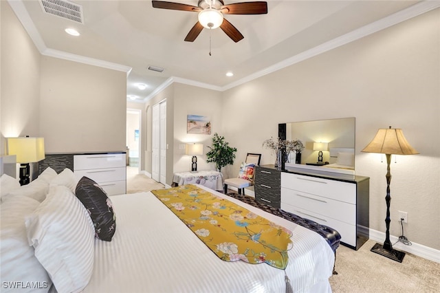 bedroom with light colored carpet, ceiling fan, and crown molding