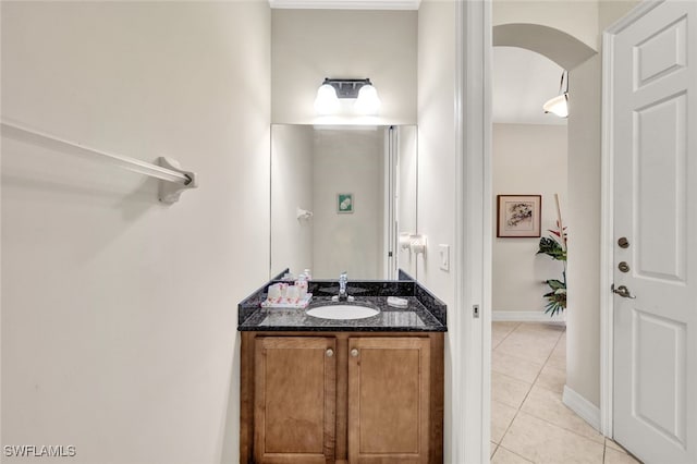 bathroom featuring tile patterned floors and vanity