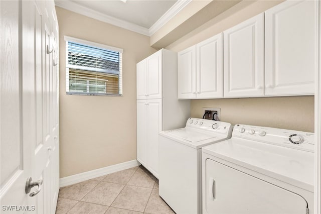 clothes washing area with cabinets, separate washer and dryer, crown molding, and light tile patterned flooring