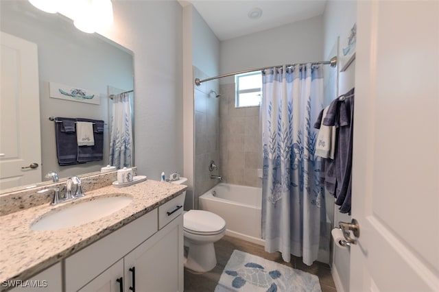 full bathroom featuring vanity, toilet, and shower / bath combo with shower curtain