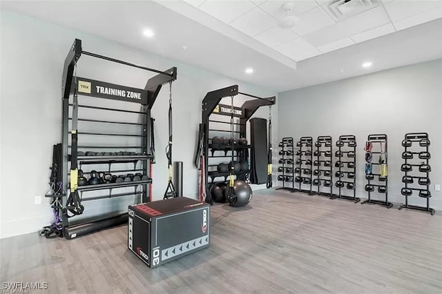 gym featuring hardwood / wood-style flooring