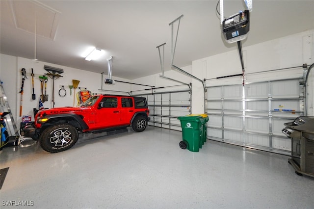 garage featuring a garage door opener