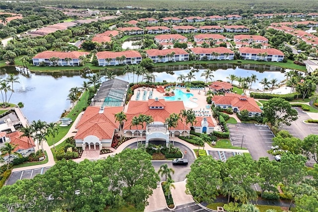 drone / aerial view with a water view