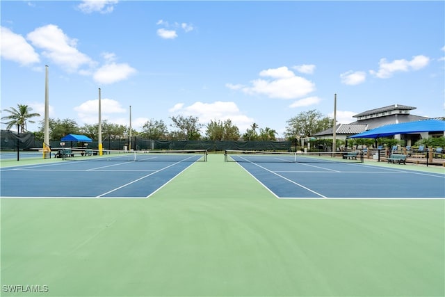 view of sport court with basketball hoop