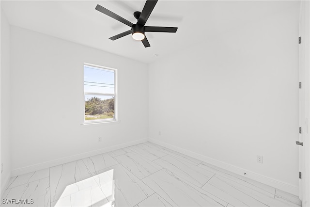 unfurnished room featuring ceiling fan