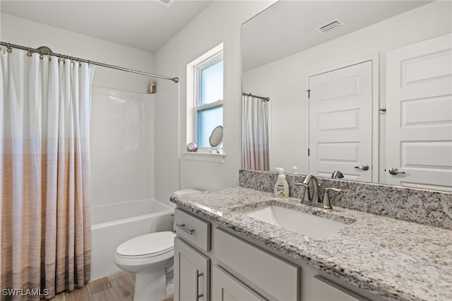 full bathroom with toilet, vanity, shower / tub combo, and hardwood / wood-style flooring