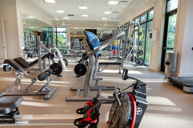 gym featuring a paneled ceiling