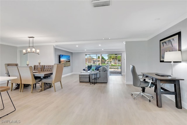 interior space featuring an inviting chandelier, light hardwood / wood-style flooring, and crown molding