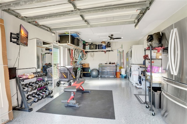 garage featuring stainless steel refrigerator