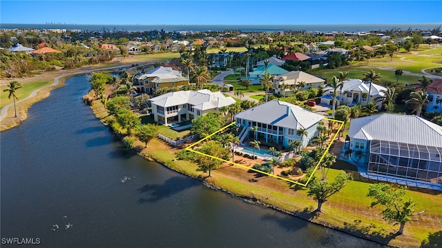 drone / aerial view featuring a water view