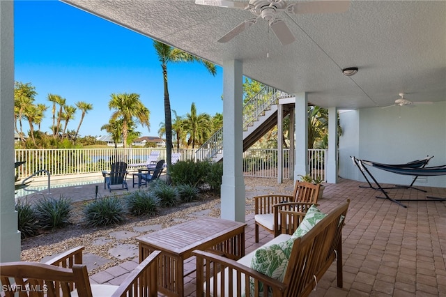 view of patio with ceiling fan