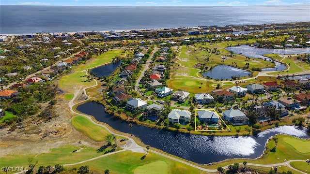 bird's eye view with a water view