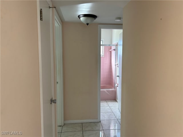 hallway with light tile patterned flooring