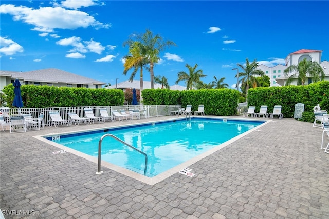 view of swimming pool featuring a patio