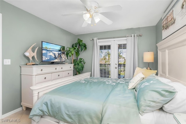 bedroom with light tile patterned floors, french doors, access to outside, and ceiling fan