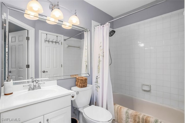 full bathroom with vanity, toilet, and shower / tub combo