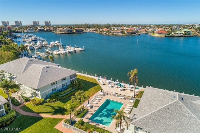 drone / aerial view with a water view