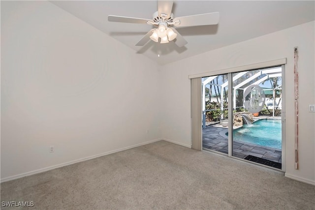 unfurnished room with carpet flooring, ceiling fan, and lofted ceiling