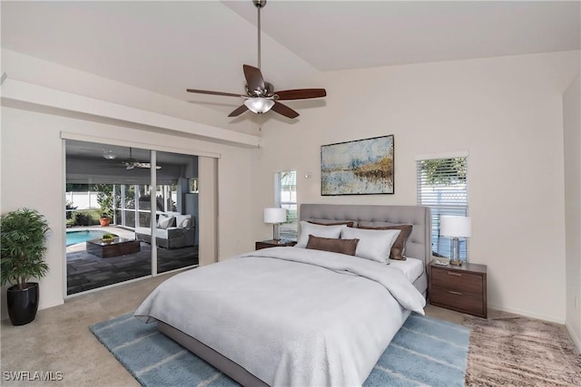 bedroom featuring access to exterior, light carpet, vaulted ceiling, ceiling fan, and multiple windows