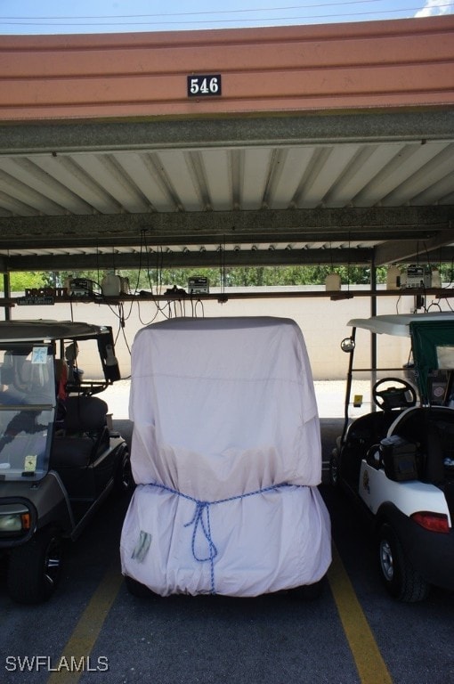 view of car parking featuring a carport