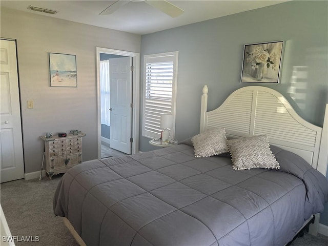 bedroom with ceiling fan and carpet flooring