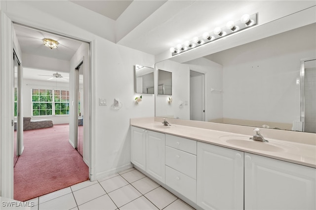 bathroom featuring tile patterned floors, ceiling fan, and vanity