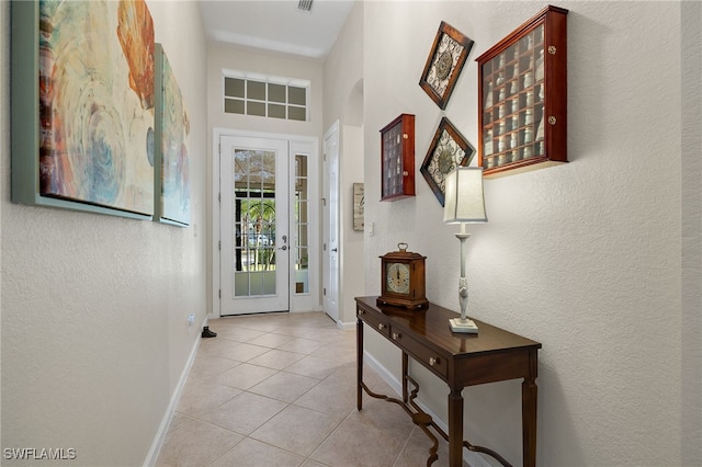 view of tiled foyer entrance