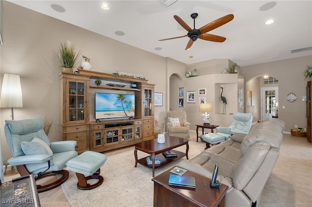 living room featuring ceiling fan and light tile patterned floors