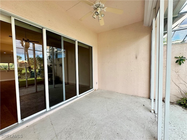 view of patio with ceiling fan