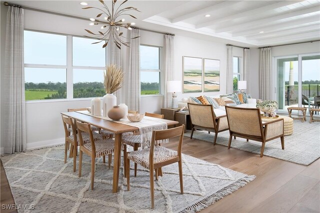 sunroom with beam ceiling and an inviting chandelier