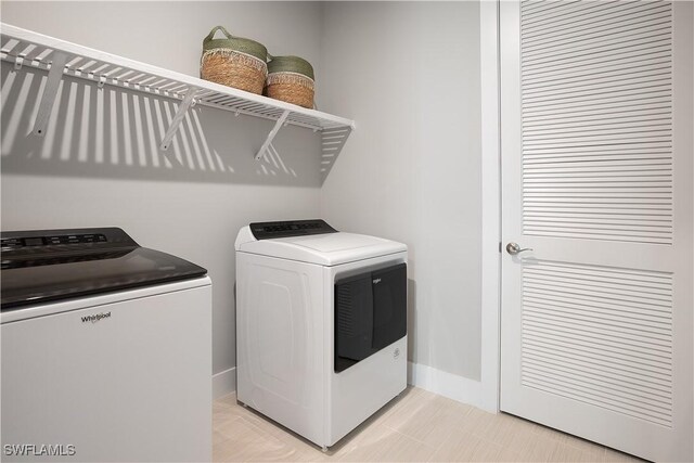 washroom featuring separate washer and dryer