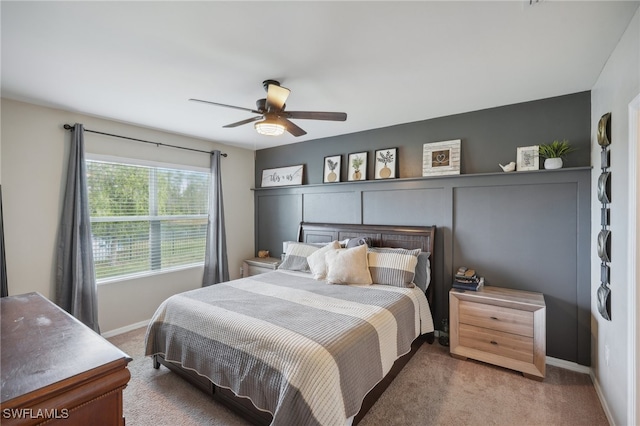 bedroom featuring ceiling fan and carpet floors