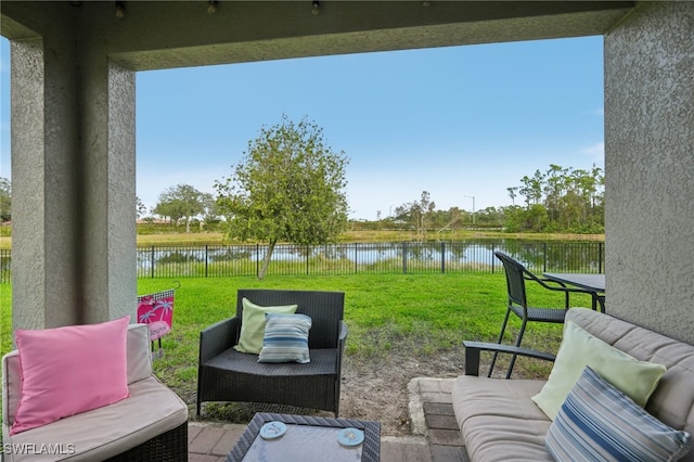 view of patio / terrace with a water view