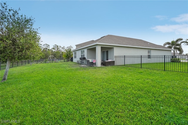 view of yard featuring an outdoor living space and a patio