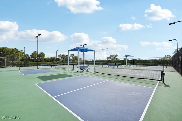 view of tennis court with basketball court