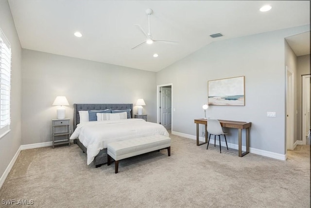 carpeted bedroom with multiple windows, vaulted ceiling, and ceiling fan